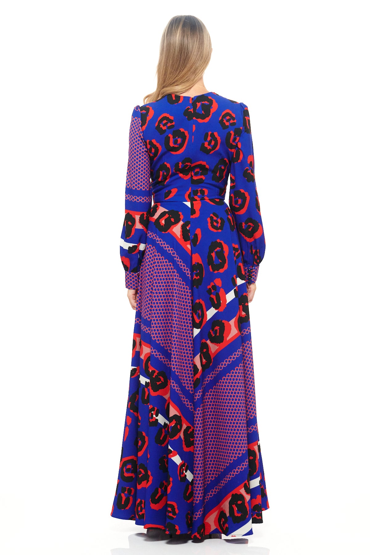 RHOEN bespoke leopard print maxi dress – luxury gown with deep V-neck, fitted waist, and statement full skirt in bold red and blue pattern.
