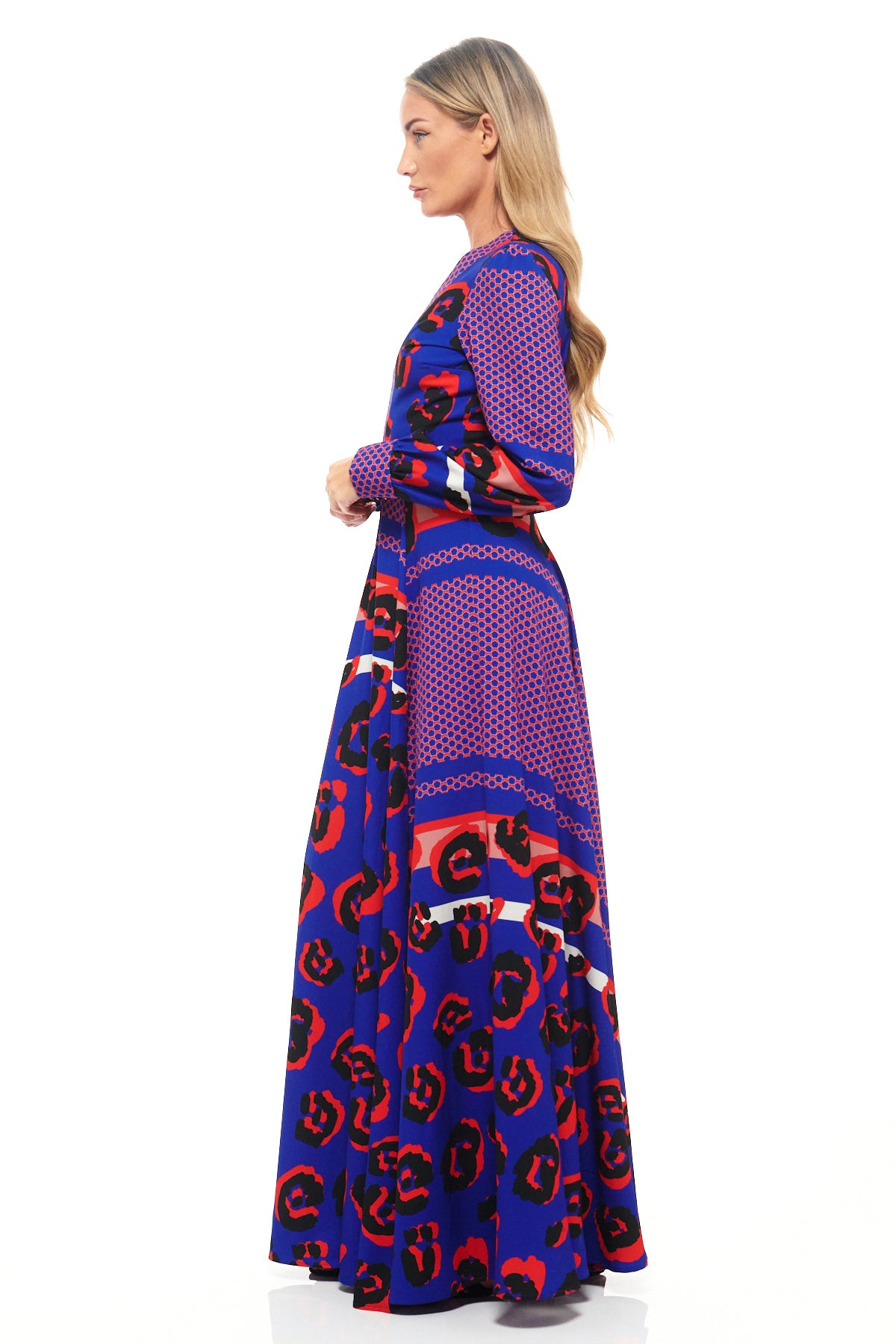 Bold animal print maxi dress by RHOEN (formerly Rebecca Rhoades) – long sleeve designer gown in bespoke blue and red leopard print.