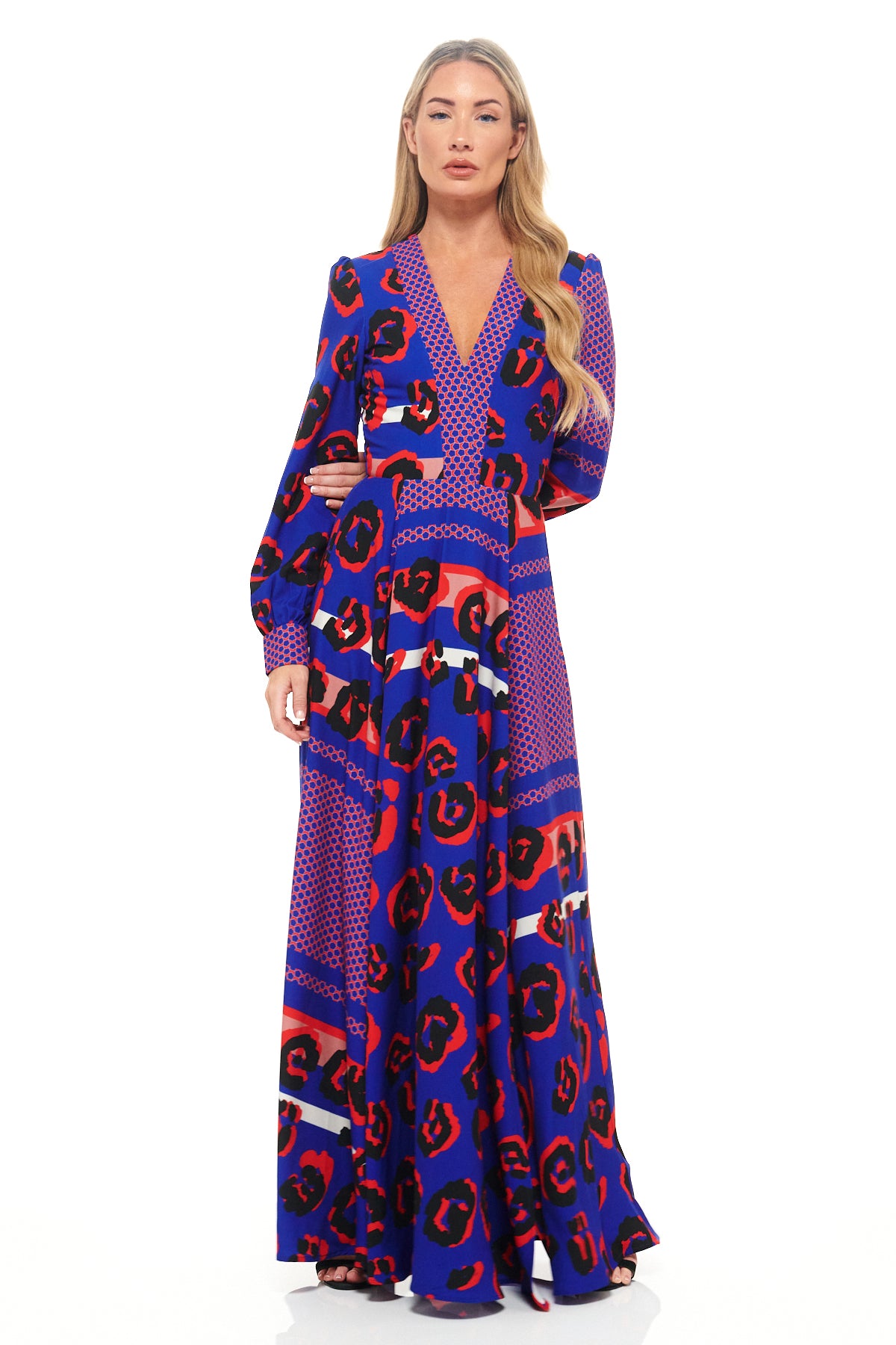 Luxury RHOEN maxi dress in bespoke blue and red leopard print, designed by Rebecca Rhoades. Features a plunging neckline, long sleeves, and elegant full skirt for statement eveningwear.