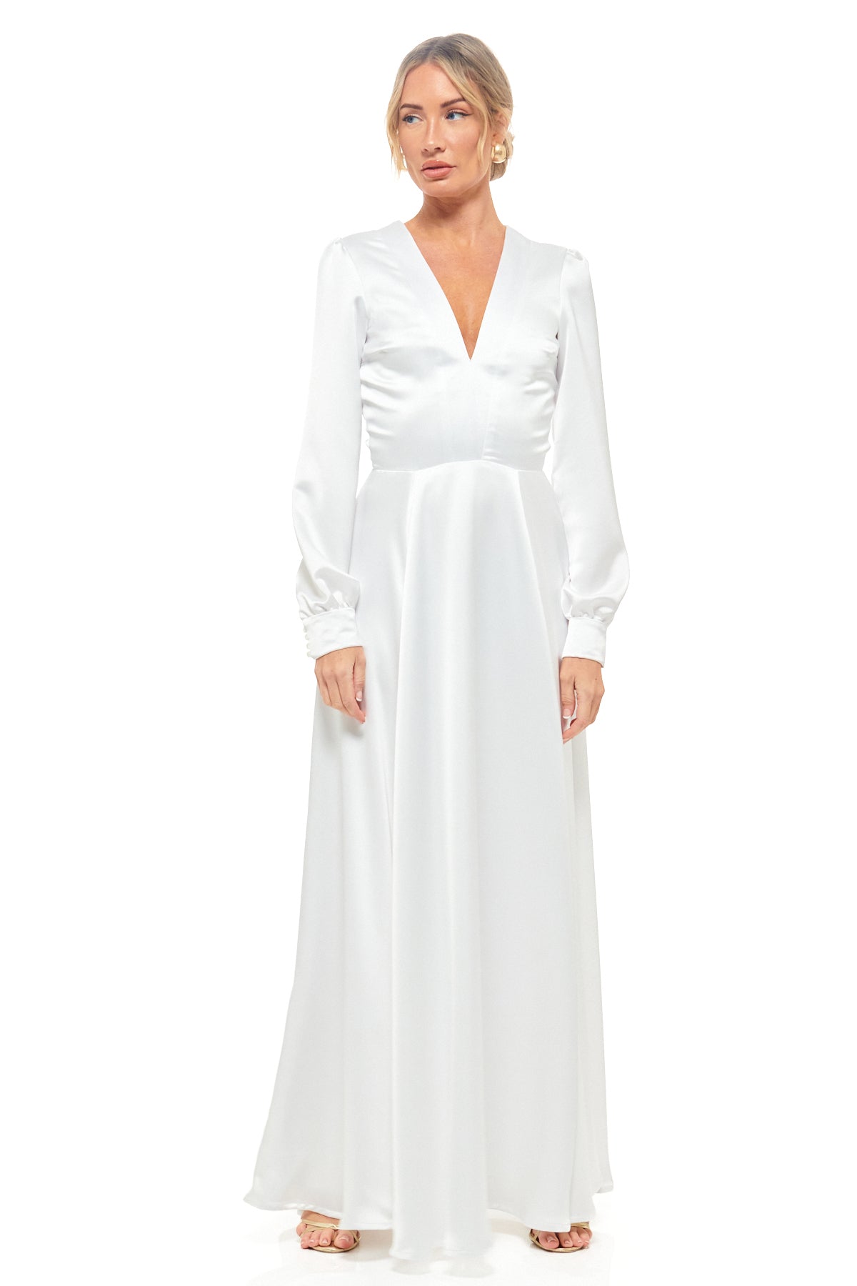 Designer satin gown by Rhoen (previously Rebecca Rhoades) – elegant white maxi dress with long sleeves, deep V cut, and flowing hemline.