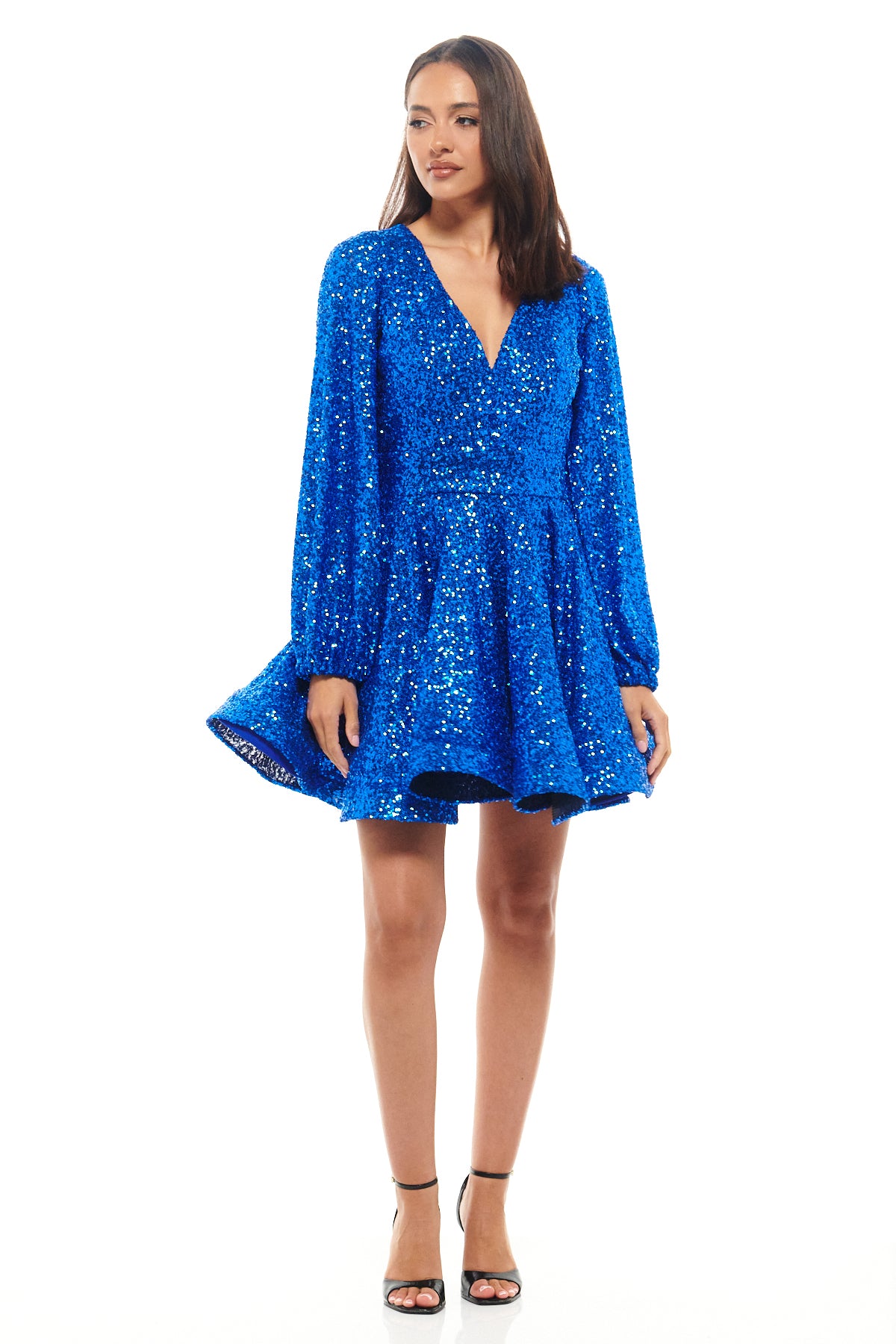 Rhoen blue sequin mini dress with deep plunge neckline, long sleeves and full skater skirt – a bold party dress designed by Rebecca Rhoades under her new Rhoen label.