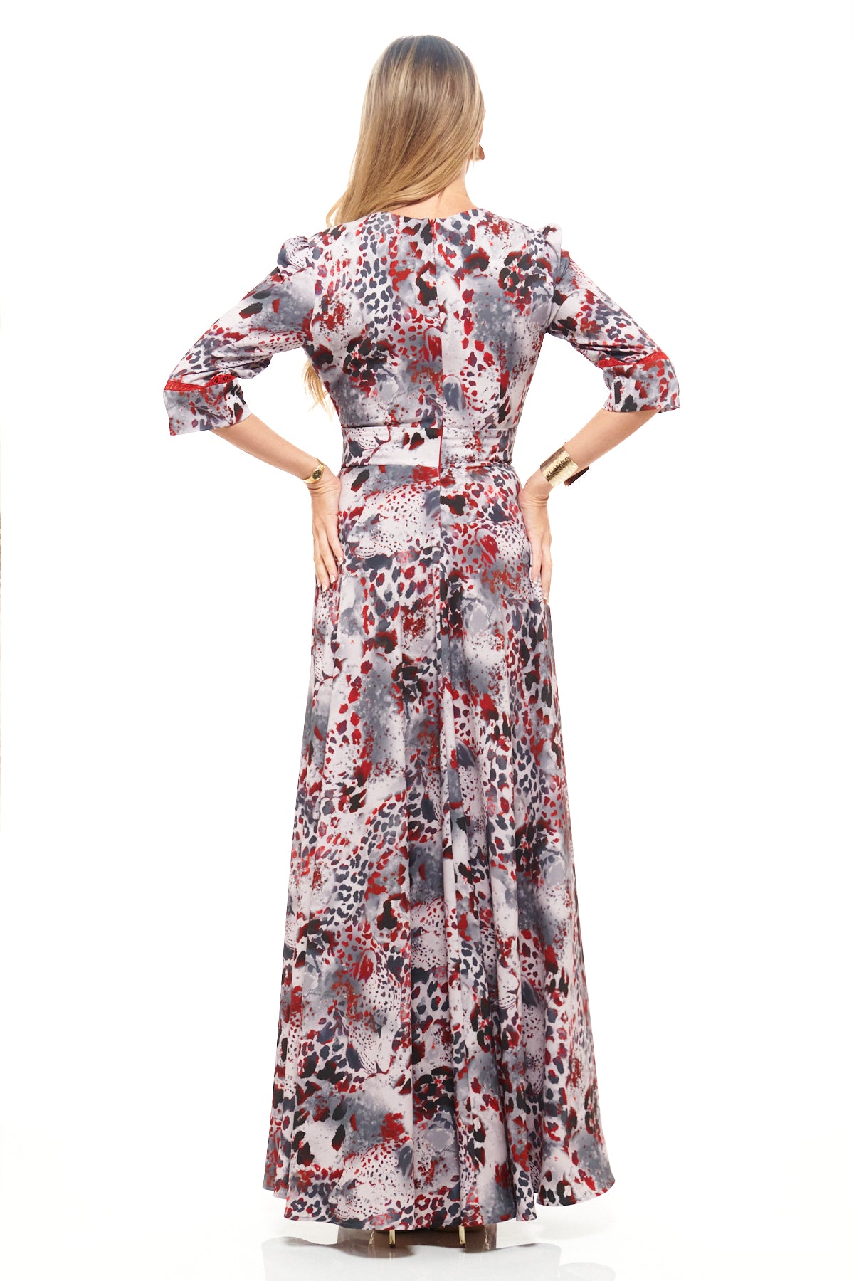 RHOEN bespoke animal print gown – full-length maxi dress with tailored waist, half sleeves, and striking red and grey pattern. Designed by Rebecca Rhoades.