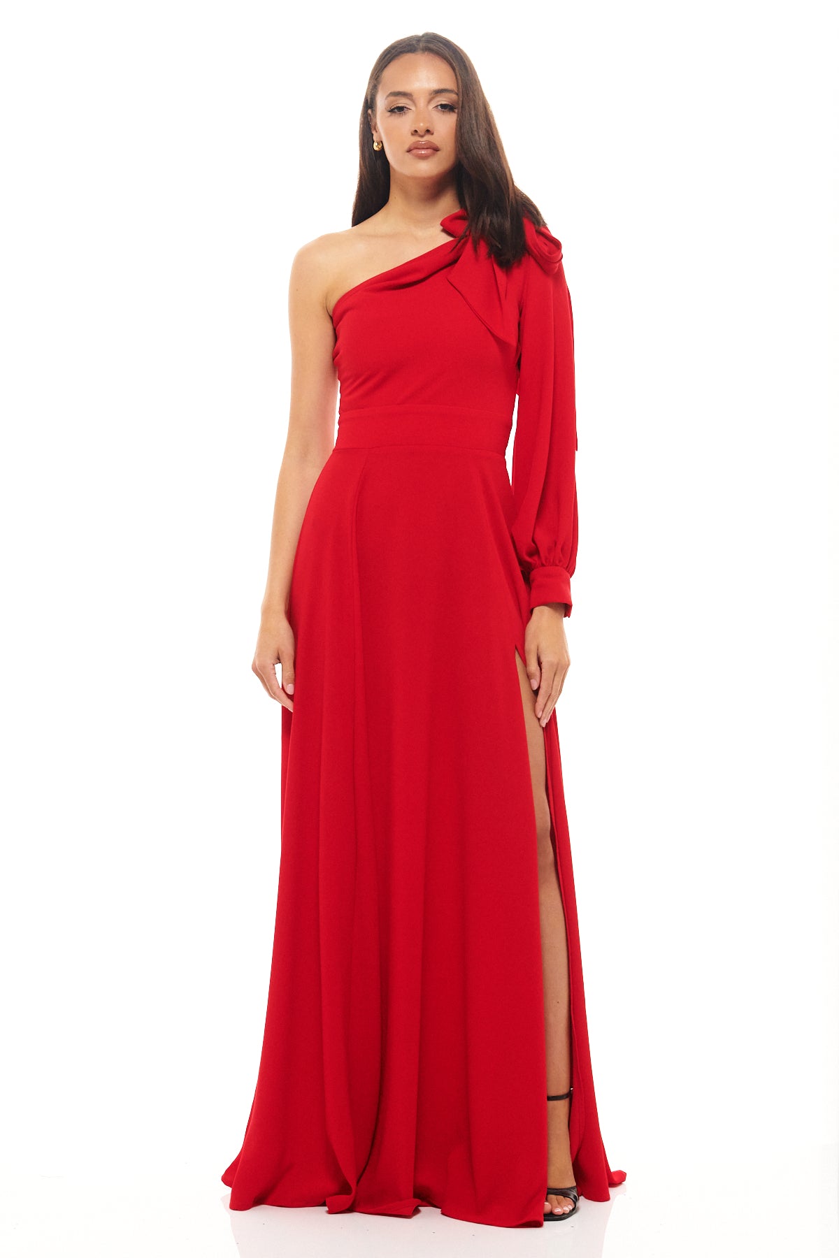 Rhoen red one-shoulder maxi dress with dramatic puff sleeve, fitted waist and thigh-high split, designed for striking evening elegance.