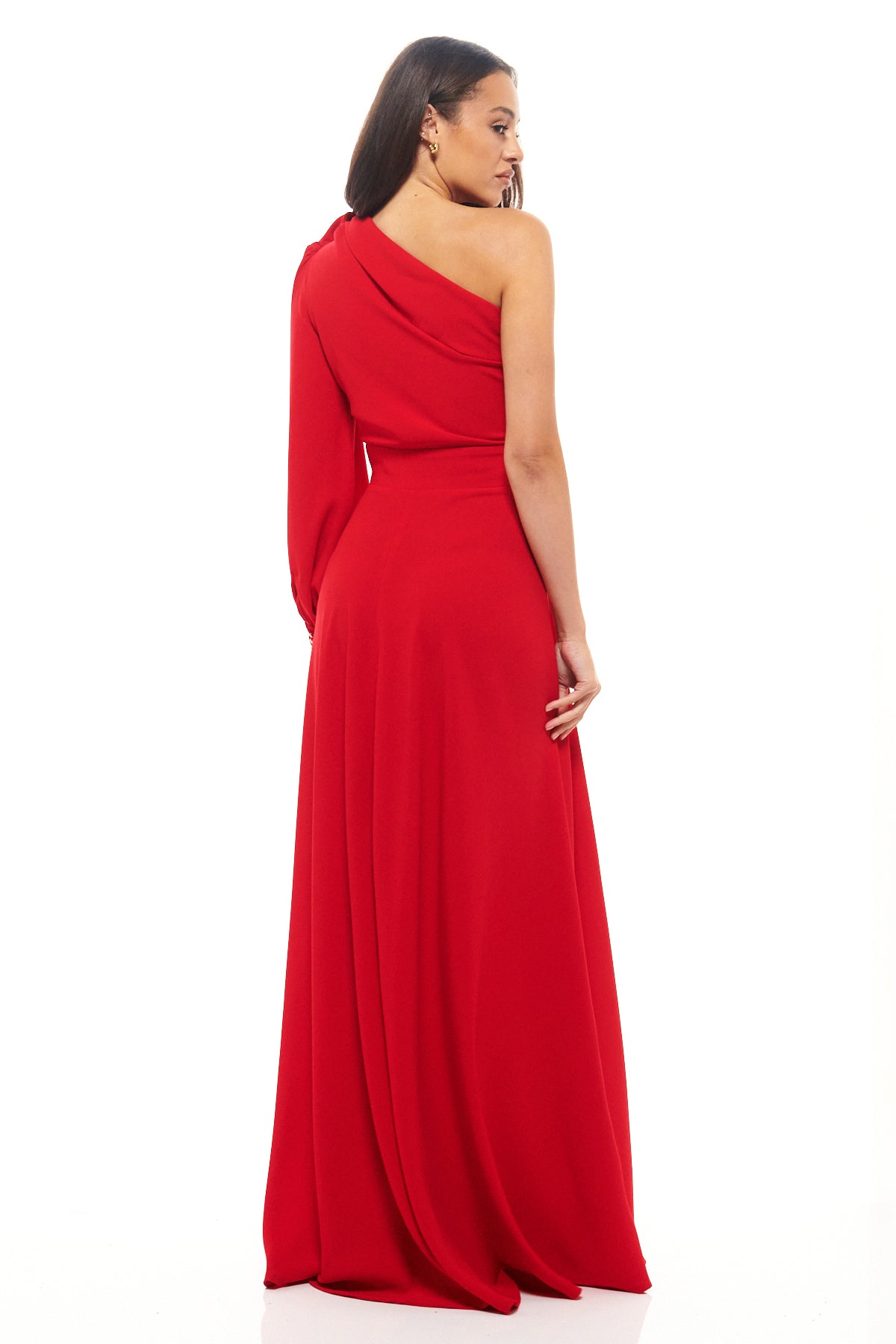 Bold red Rhoen maxi dress with one-shoulder design, full-length drape and slit detail, combining timeless elegance with contemporary flair.