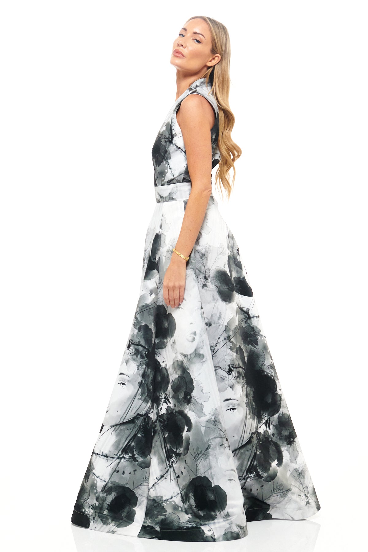 Rebecca Rhoades design for RHOEN – elegant sleeveless black and white gown with cinched waist and unique illustrated floral face print.