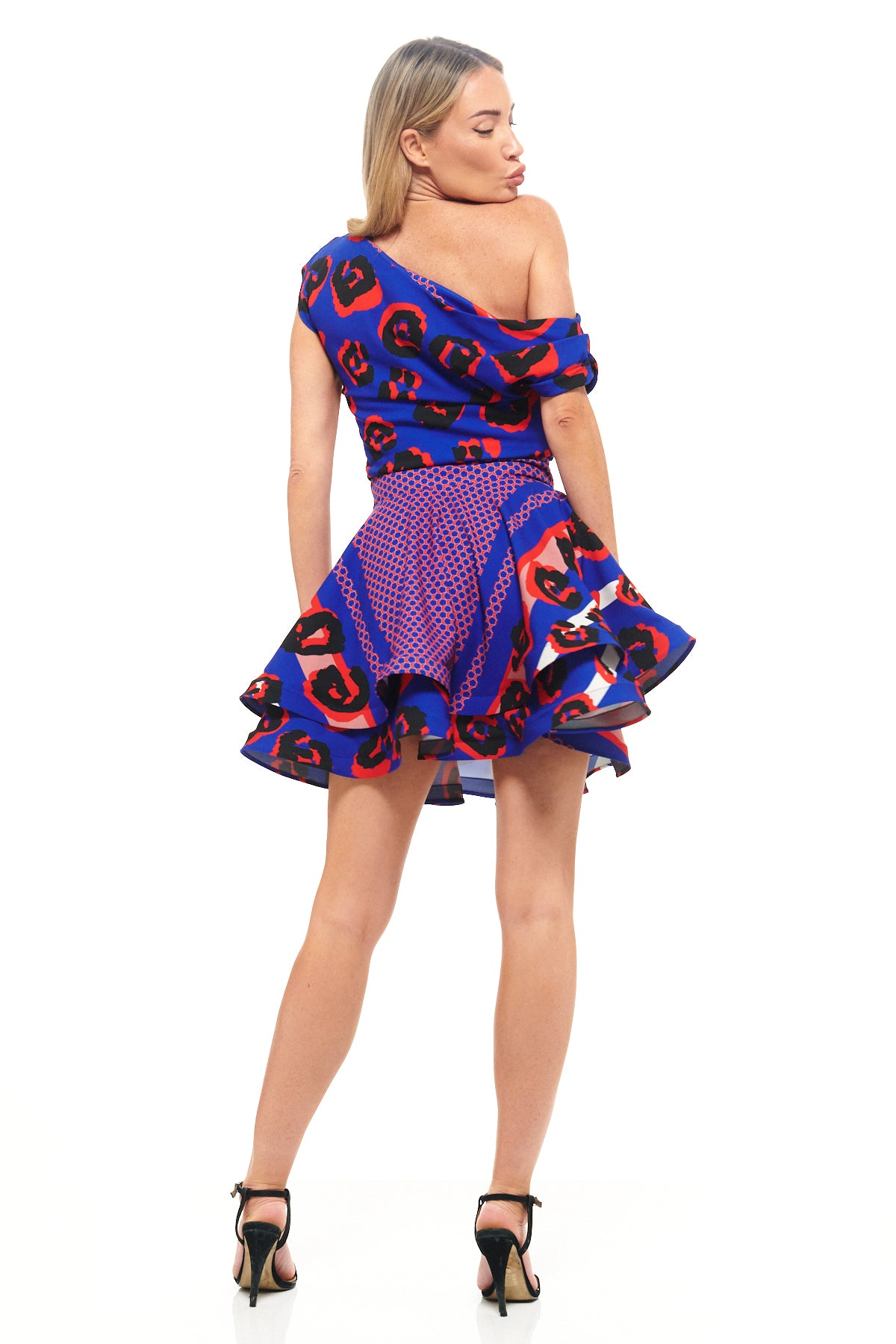 RHOEN statement mini dress – bespoke animal print design by Rebecca Rhoades with fitted waist, ruched detailing, and playful flared hemline.