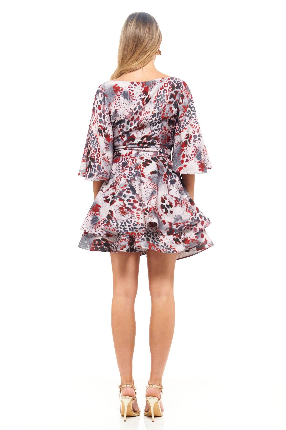 Designer mini dress by RHOEN (formerly Rebecca Rhoades) – striking red and grey animal print pattern with wide sleeves and flirty A-line silhouette.