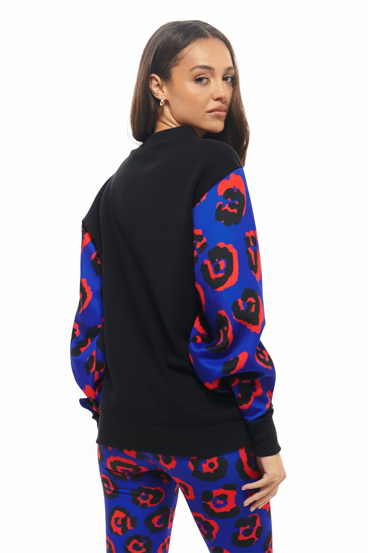 Oversized black sweatshirt with exclusive RHOEN Blue Leopard sleeves, a striking balance of minimal and bold.