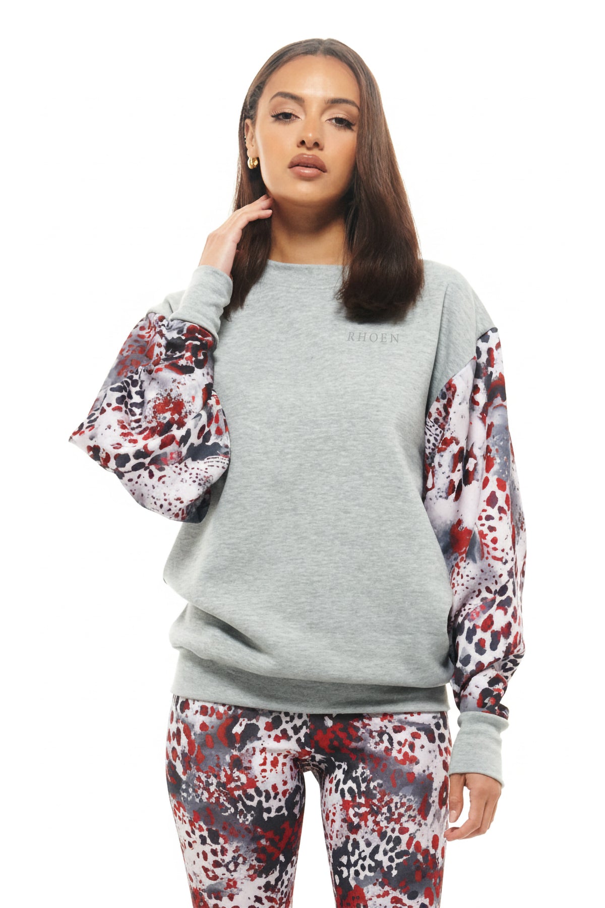 Grey RHOEN sweatshirt with statement balloon sleeves in the bespoke grey Leopard print, styled with matching leggings.