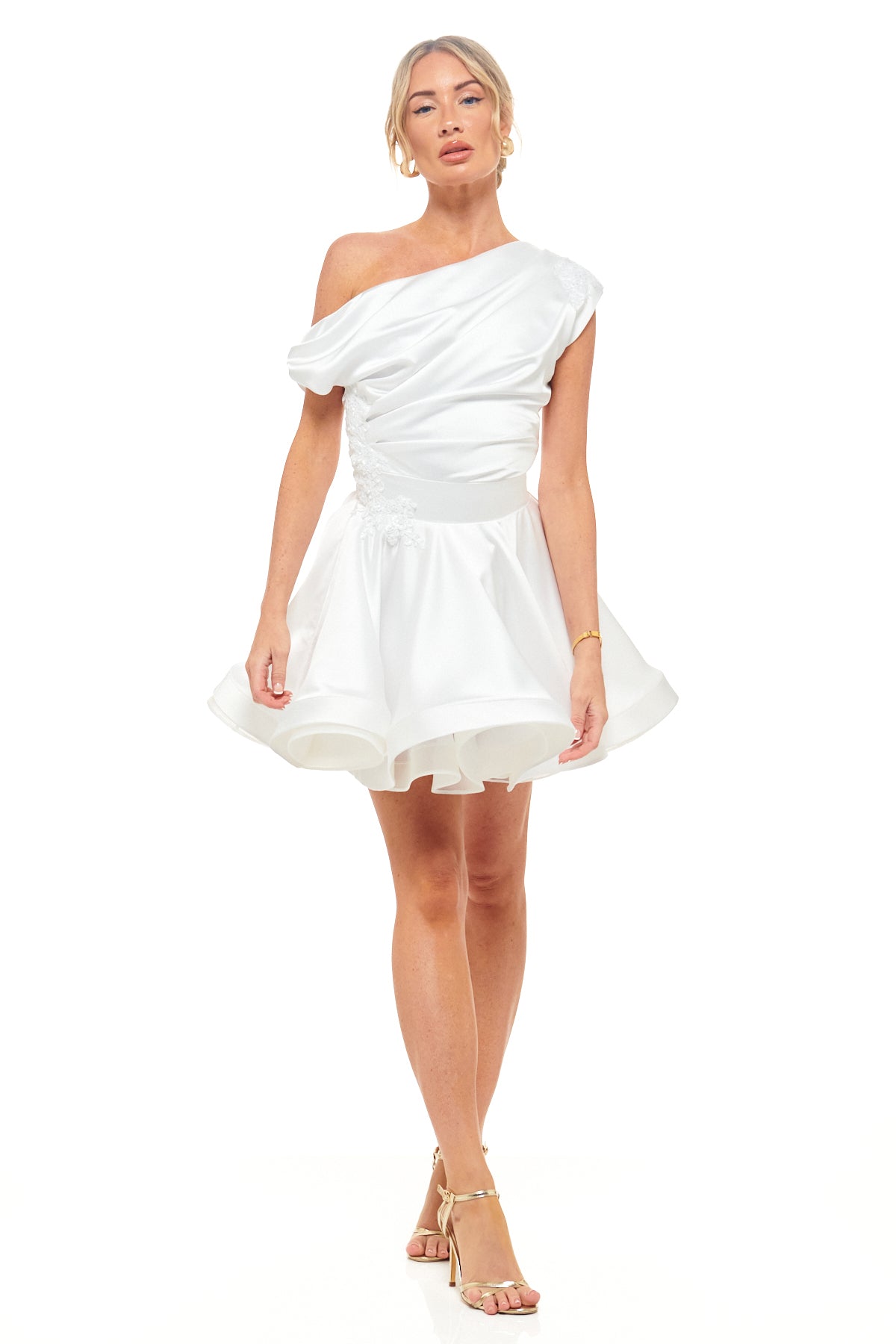 RHOEN ivory bridal reception mini dress – one-shoulder satin gown with ruched bodice, applique detail, and flared skirt, ex-Rebecca Rhoades.