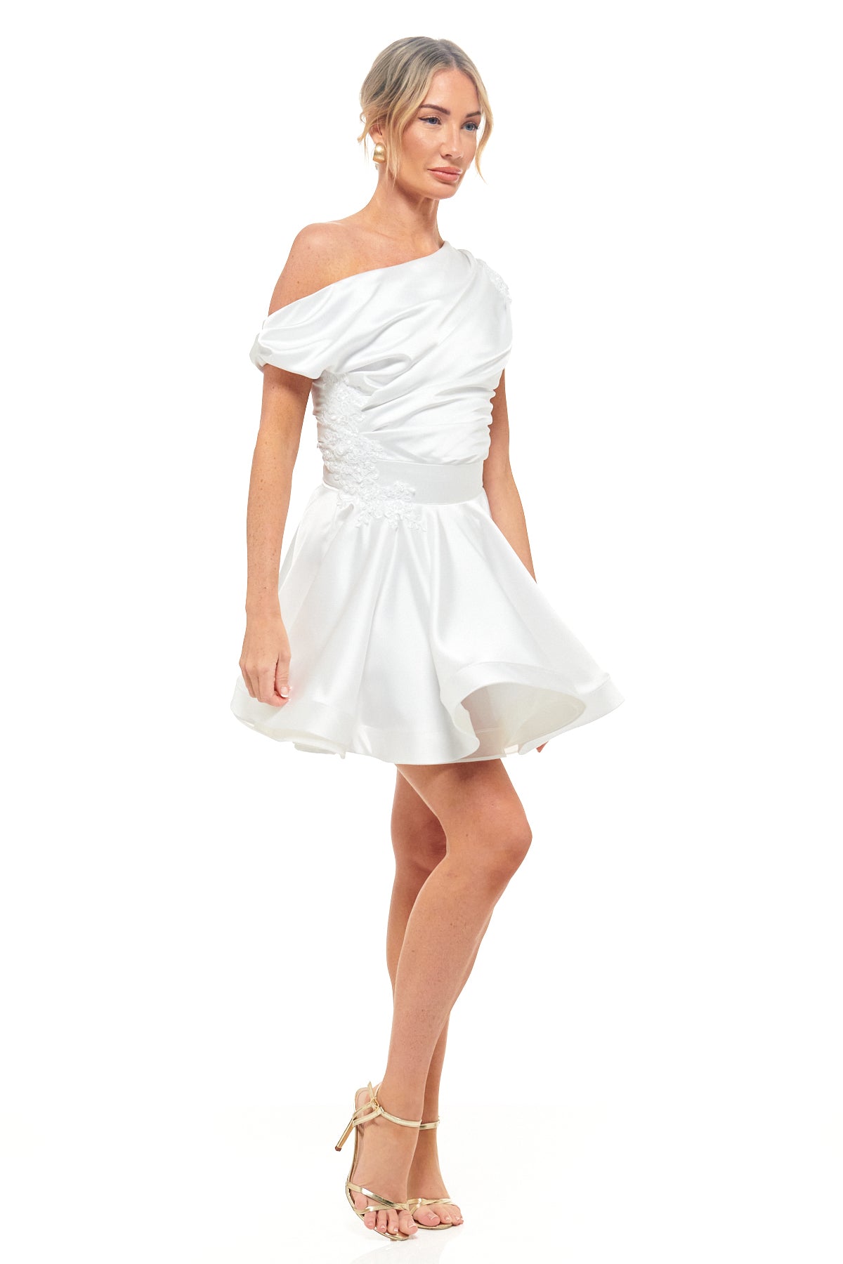 Modern rehearsal dinner dress – RHOEN ivory asymmetric mini gown with draped neckline and playful short hemline.