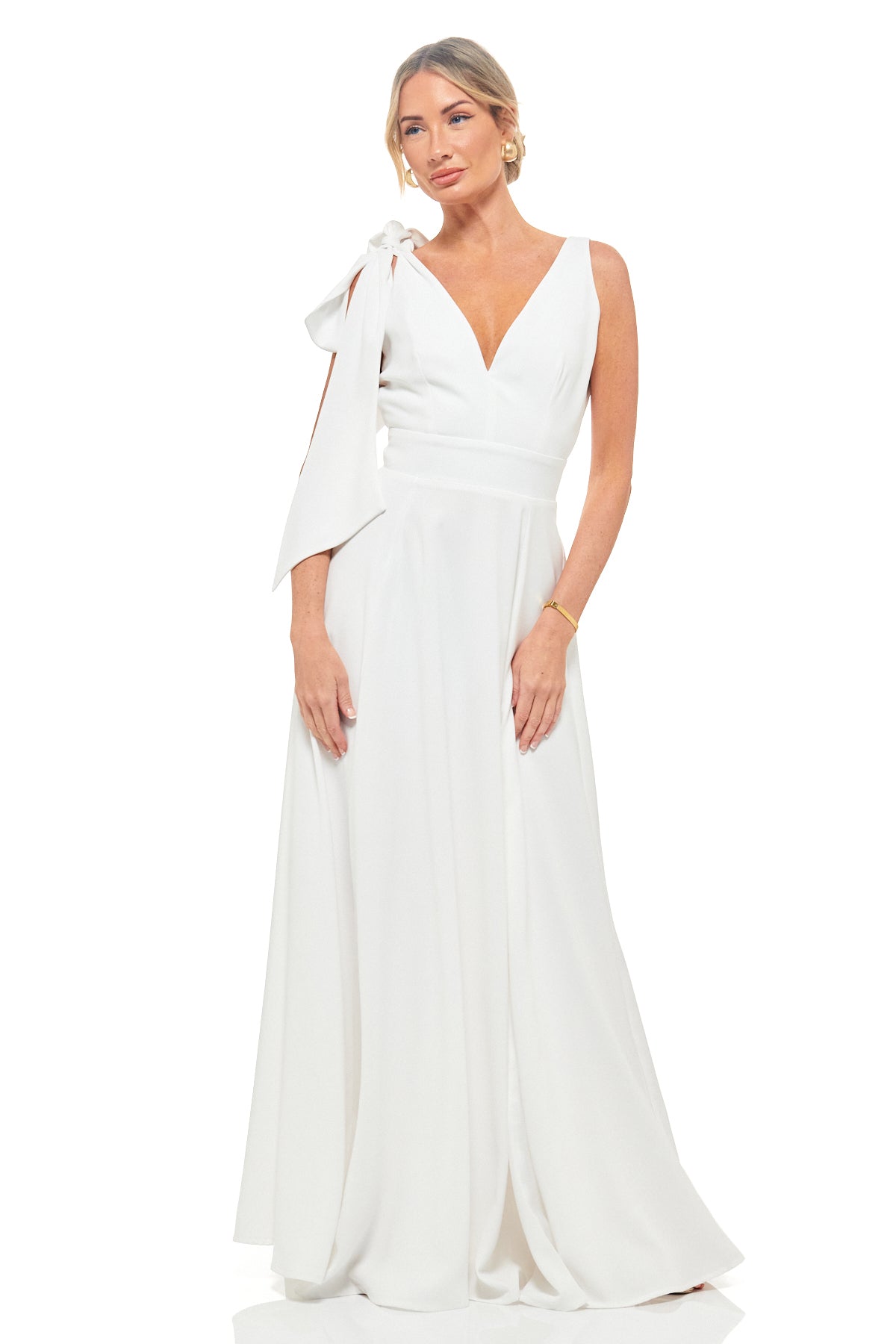 The RHOEN ivory bow shoulder dress – elegant full-length satin gown with plunging neckline and flowing skirt, previously Rebecca Rhoades.