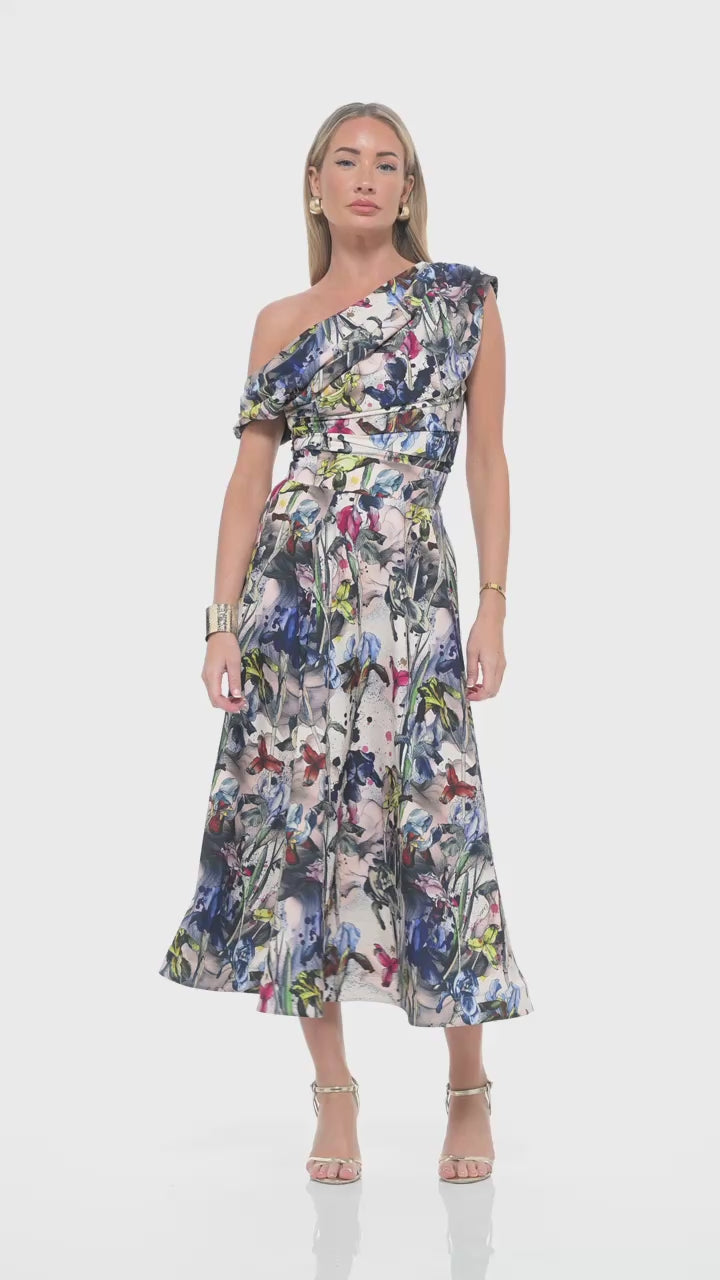RHOEN bespoke print midi dress video – showcasing exclusive floral design by Rebecca Rhoades with one-shoulder ruched bodice, asymmetric neckline, and flowing A-line skirt. Luxury designer occasionwear for weddings and events.