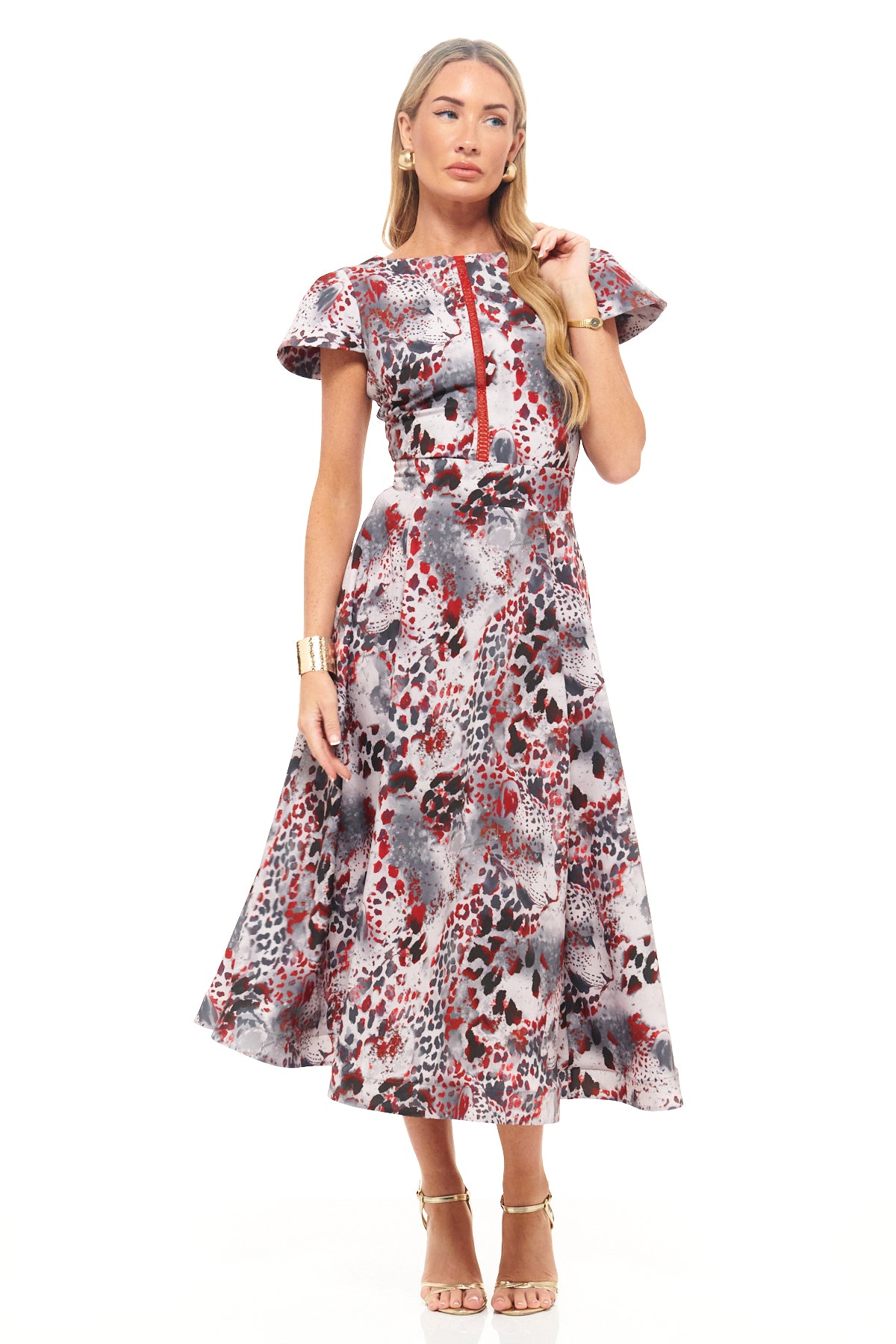 RHOEN animal print midi dress with flutter sleeves, fitted waist, and flowing A-line skirt. Red, grey, and black bespoke print designed by Rebecca Rhoades.

