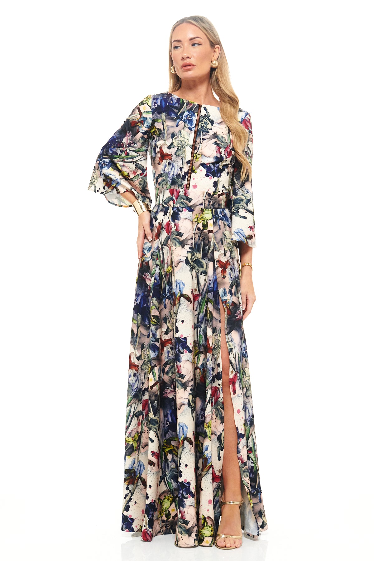 RHOEN bespoke print maxi dress with long sleeves, front zip detail, and thigh-high slit. Luxury designer gown featuring exclusive Rebecca Rhoades floral artwork.