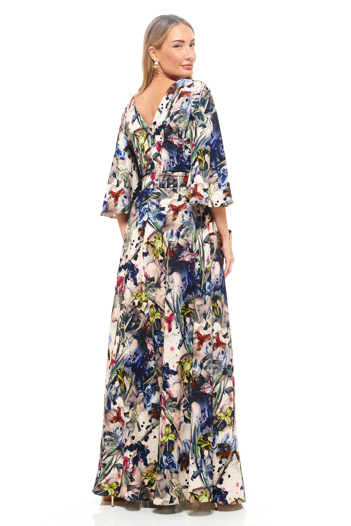 Designer printed maxi gown by RHOEN – bespoke floral pattern created by Rebecca Rhoades, with flared sleeves, front zip neckline, and dramatic leg slit.